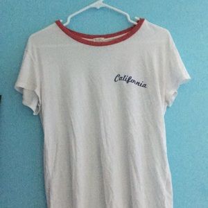Cute brandy Melville t shirt says California on it